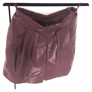 Burgundy faux leather shorts